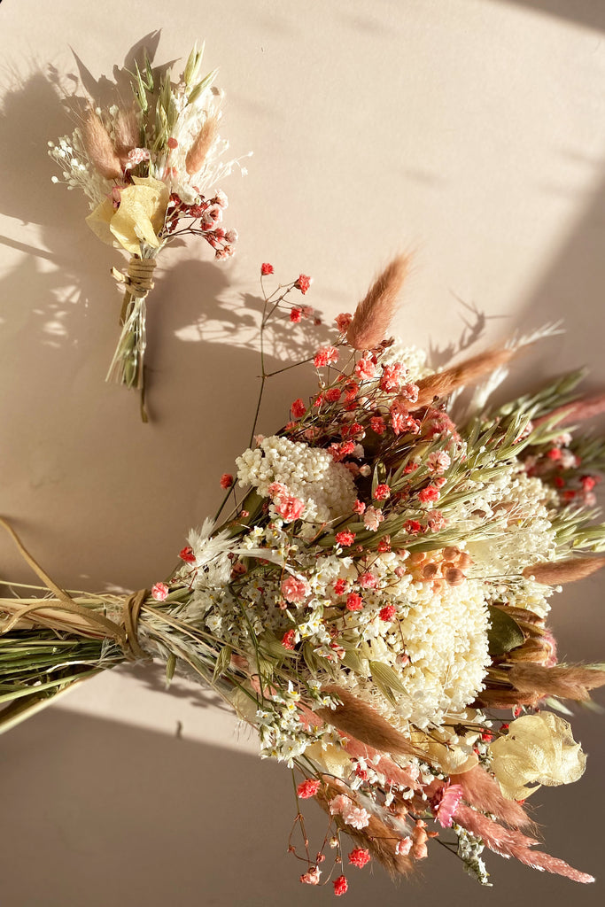 Blush toned bridal bouquet and boutonniere 