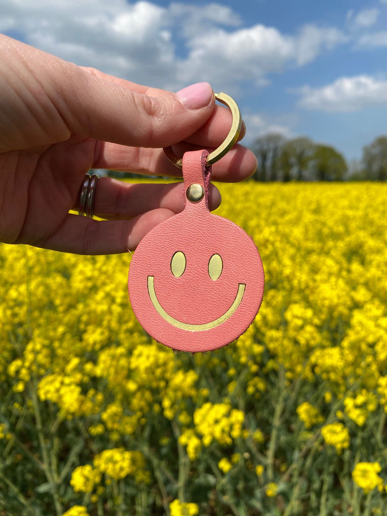 pink smiley key ring