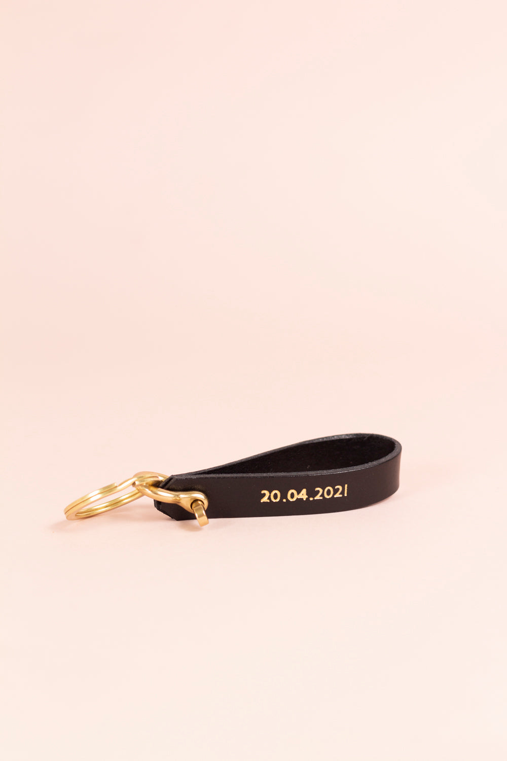 black and and sand shackle keyring